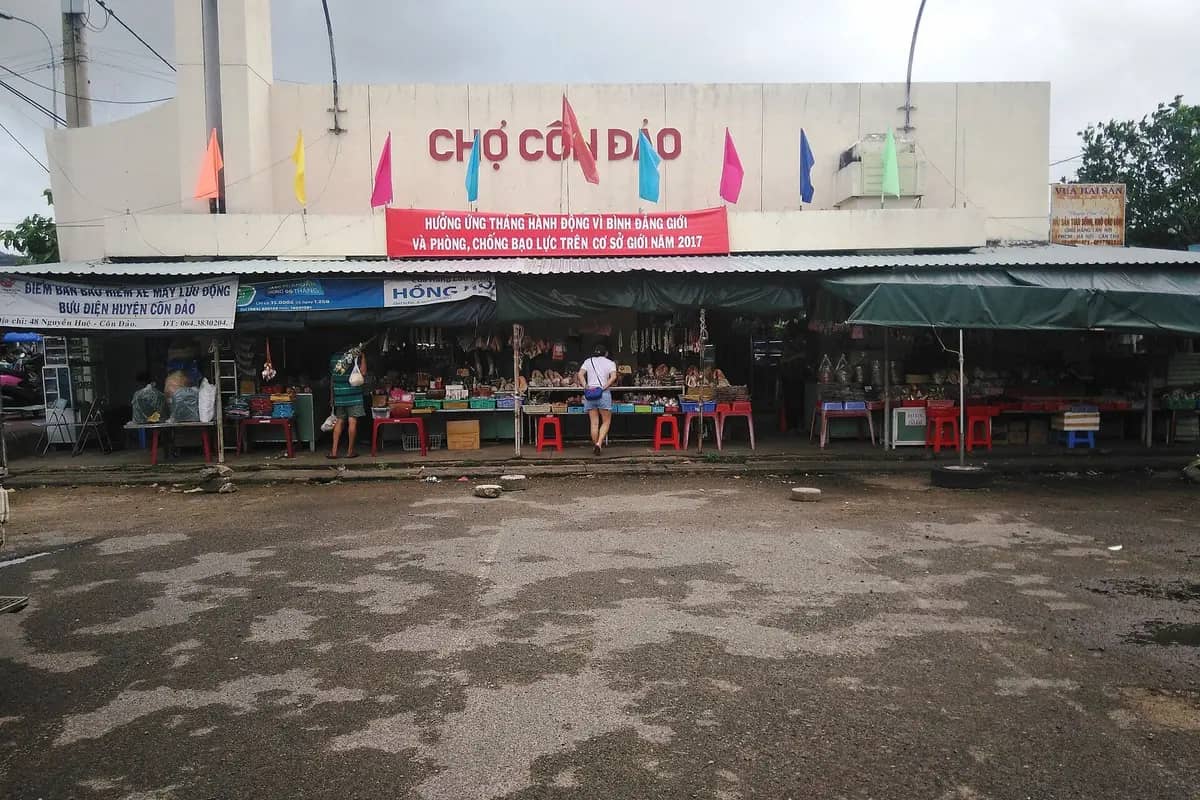 The front of Con Dao market, stalls under its awning