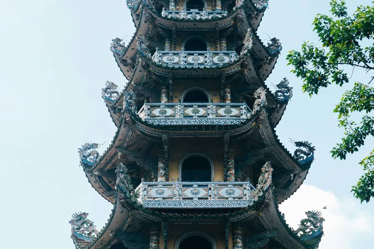 The mosaic-covered bell tower of Linh Phuoc Pagoda, a dragon on every tier