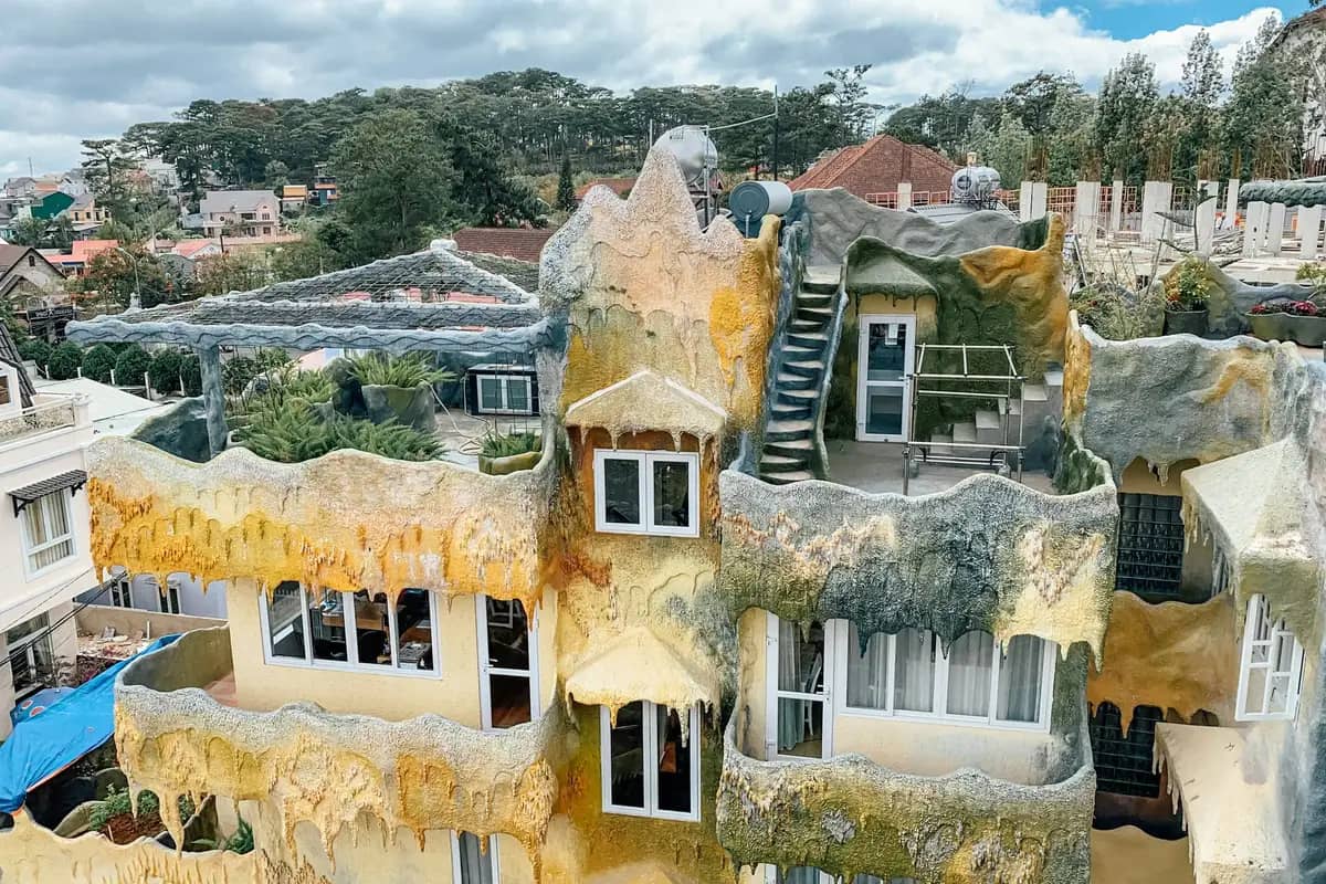 Melted-looking walls, balconies and an outside stairway at the Crazy House in Da Lat