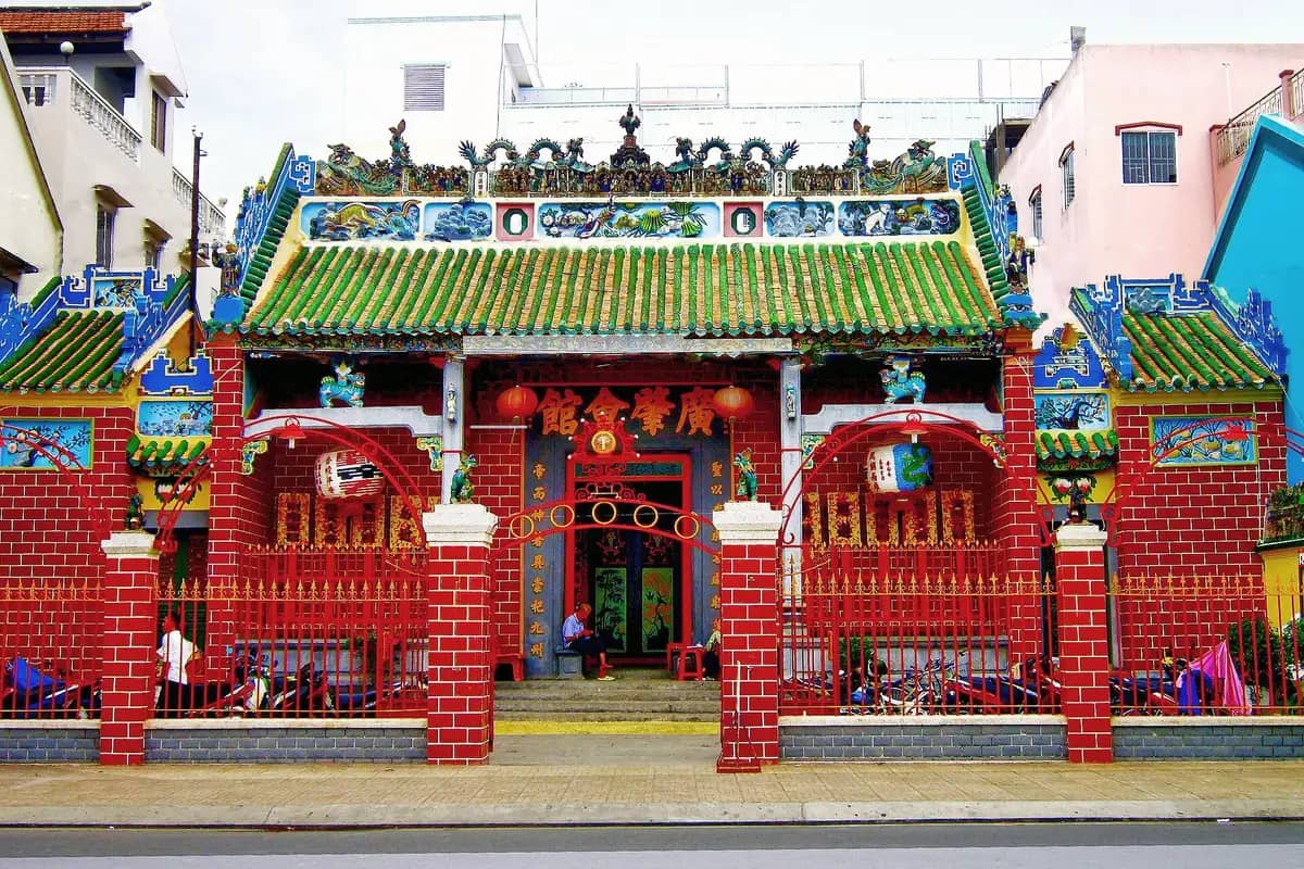 The red brick and green-tiled front of Chua Ong, the Cantonese assembly hall in Can Tho