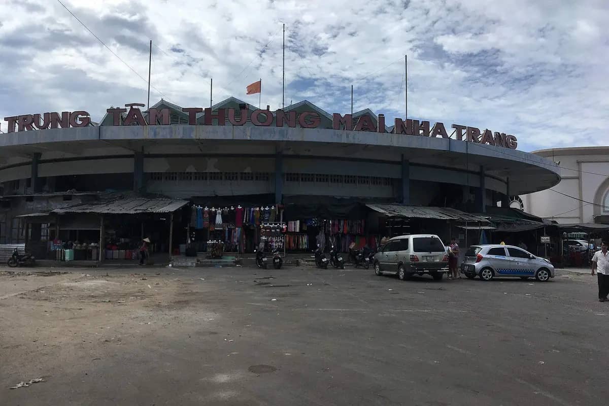 The round Dam Market building in Nha Trang, clothes stalls under its curved roof
