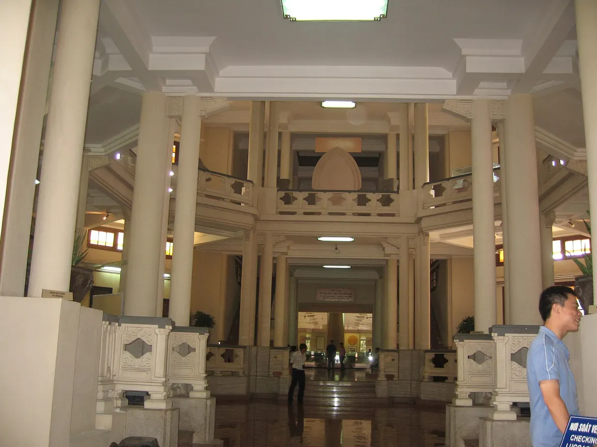 The museum's central hall, a ring of cream columns and balconies around an open stairwell